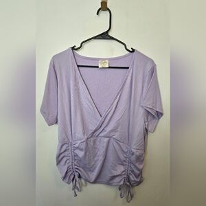 260. One Step Up Lavender Ruched Top